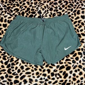Nike athletic dri-fit running shorts. Size M. Lightly worn. Like new.
